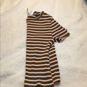 Tight fitted striped shirt.